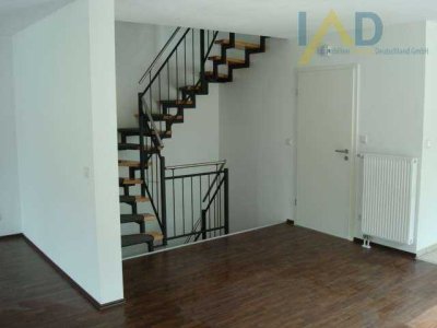 Charmantes Reiheneckhaus mit großzügiger Dachterrasse und idyllischem Garten in ruhiger Lage.