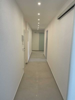 Moderne 4-Zimmer-EG-Wohnung mit großer Terrasse, 200 m² Garten & Garage – Erstbezug nach Sanierung