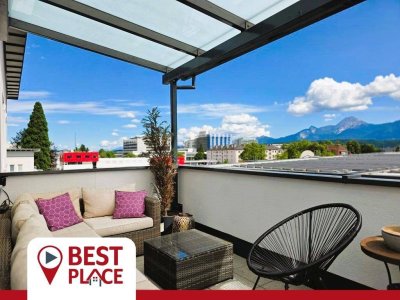 Leben ON TOP mit Stadt- und Bergpanorama