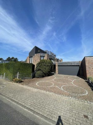 Doppelhaushälfte mit  Kamin, Einbauküche und Traumgarten in Kamp-Lintfort (Niersenbruch)