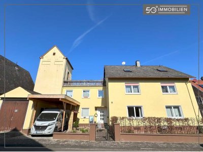 Vielseitiges Mehrparteienhaus mit diversen Optionen und großzügigen Nutzflächen in begehrter Lage
