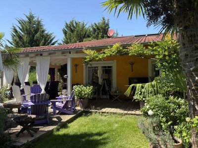Mediterranes Refugium mit vielseitigem Nutzungspotenzial – Wohnen & Arbeiten in stilvoller Einheit!