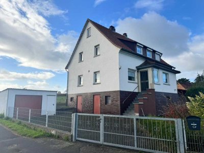 Einfamilienhaus mit Fernblick und großem Grundstück