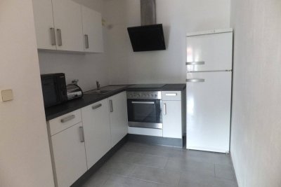 Südausgerichtete 2-Zimmer Erdgeschosswohnung mit Balkon und Garage