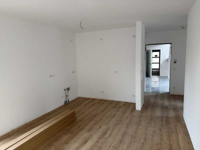 Traumhafte 2-Zimmer-Neubauwohnung im Erdgeschoss – Erstbezug mit eigenem Garten.