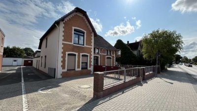 Bungalow und drei vermietete Eigentumswohnungen