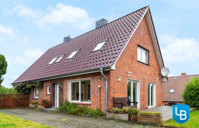 Familienparadies auf großem Grundstück: Gepflegtes und modernisiertes EFH mit weitläufigem Garten