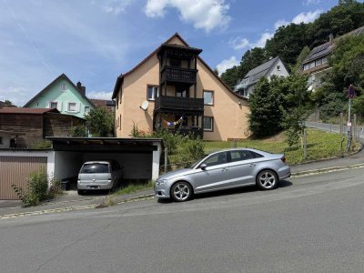 Schönes Mehrfamilienhaus mit Garagen, Garten in Top-Lage