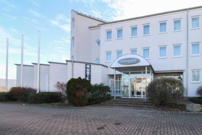 Kapitalanlage: Einnahmestarkes Hotelzimmer in zentraler Lage von Limburgerhof