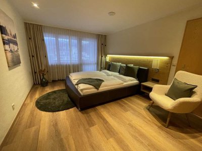 Möblierte 2-Zimmer-Wohnung im Obergeschoss mit Südbalkon