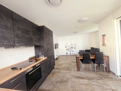 Topmoderne 4-Zimmer-Wohnung mit Einbauküche und 2 Tiefgaragenplätzen zu vermieten