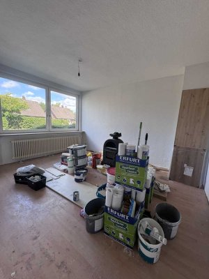 Eine Wunderschöne 2 - Zimmer Wohnung mit eigener Terrasse + Garten und einer neuen Einbauküche