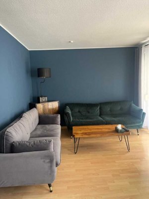 Sonnige 3 Zimmer Wohnung mit großer Terrasse und Gartenanteil