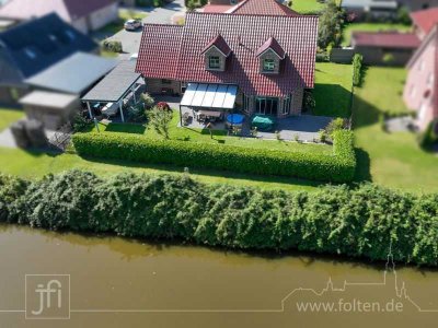 Wie neu: Traumhaus mit Wassergrundstück, PV-Anlage und Speicher im Fischerdorf Ditzum