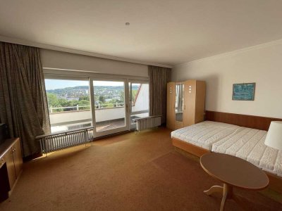 Möbliertes 1-Zimmer-Apartment mit Küchenzeile und Balkon