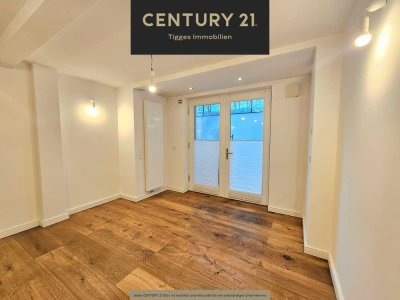 ** wesernahe & moderne Souterrainwohnung **