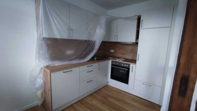 Charmante, neuwertige 2-Zimmer-Wohnung mit Fachwerkflair, Stellplatz und Gartennutzung