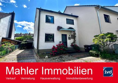 Sanierungsbedürftiges Reihenendhaus mit Garage und Stellplatz in familienfreundlicher Lage