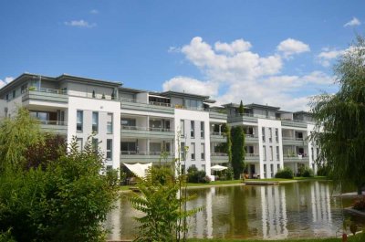 2-Zi.Penthouse mit 2 Dachterr.+2 Einbauküchen+2 Bäder, Blick auf einen See im Westen v. Rgbg.