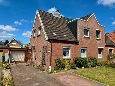 Doppelhaushälfte mit gemütlichem Garten auf Eigenland in ruhiger Seitenstraße