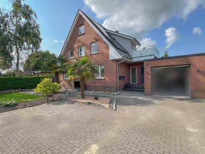 1604 - Stilvoll & ebenerdig – Lichtdurchflutete Wohnung mit Garten & Garage