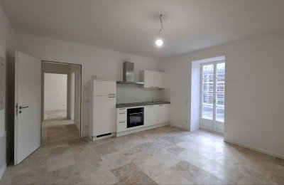 Modernes Appartement, Erstbezug mit Terrasse, EBK, Fussbodenheiz. PV Anlage