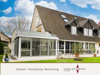 2-Familien Architekten-Wohnhaus. Ca. 339 m² Wohnfläche. Doppelgarage.
