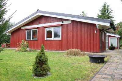 Massivholz trifft Moderne in Feldrandlage – einzigartiges Holzhaus nahe der Lüneburger Heide