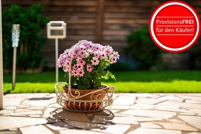 4-Zimmerwohnung im Reihenhausstil mit Privatgarten und Garage