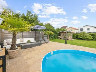 Traumgarten mit Pool trifft auf modernisiertes Einfamilienhaus in Elmshorn
