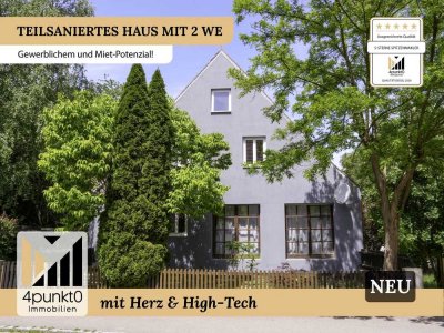Teilsaniertes Haus mit 2 Wohneinheiten, großem Keller mit Werkstatt.