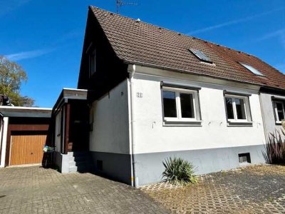 Schnuckelige Doppelhaushälfte mit Erweiterungsoption und großem  Garten in ruhiger Lage von Hilden.