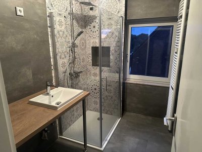 Modernisierte 3-Raum-Wohnung mit Balkon im Außenbereich von Mettingen mit Garage und Stellplatz