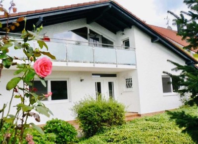 Traumhafter Bungalow mit Einliegerwohnung, Wintergarten & Baugrundstück
