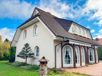 Ruhiges Einfamilienhaus mit Charme und grünem Rückzugsparadies in Hatten!