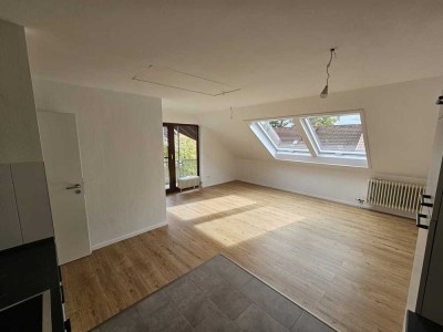 Charmante 2-Zimmer Dachgeschosswohnung mit Balkon in ruhiger Ortsrandlage