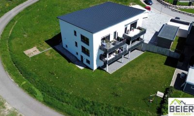 Erdgeschosswohnung mit überdachter Terrasse und Naturblick * ERSTBEZUG *