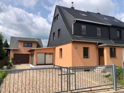 Doppelhaushälfte mit Garten und Garage