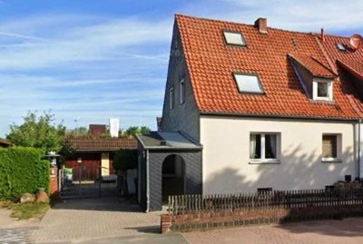 Arnum: DHH mit gr.Garten, Dachterrasse & 2 Garagen - Ideal f. Familie oder Mehrgenerationenwohnen