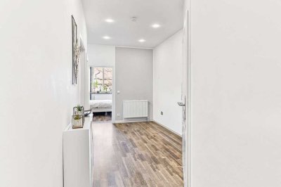 Altbau-Charme trifft modernes Wohnen – Stilvolle 3,5-Zimmer-Etagenwohnung mit Loggia am Marienplatz