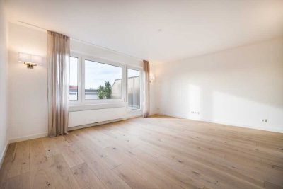Modern durchdesigntes und lichtdurchflutetes Dachterrassen- Appartement in direkter Parknähe