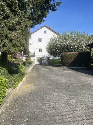 2 Familienhaus mit 140m² Werkstatt im UG und schönem Garten