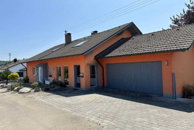 Attraktives MFH mit 3 Einheiten, Autohalle, Garage, Carport, Wintergarten mit TOP-Rendite & Optionen