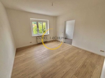 Singlewohnung in grüner, ruhiger Lage mit Außenstellplatz