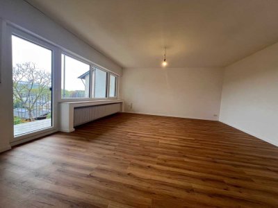 Erstbezug nach Sanierung: Geräumige 4-Zimmer Wohnung mit traumhaften Ausblick auf die Abtei
