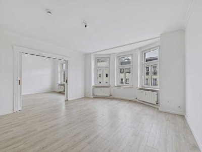 Großzügige Etagenwohnung mit 4,5 Zimmer, Balkon & Gemeinschaftsgarten - Ideal für Familien