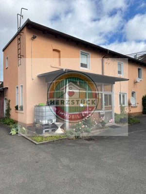 Zweifamilienhaus mit zwei vermieteten Wohneinheiten – attraktives Anlageobjekt mit Entwicklungspoten