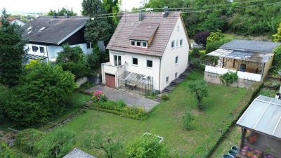 Familienidyll: Freistehendes Einfamilienhaus mit Garten und flexiblem Raumkonzept
