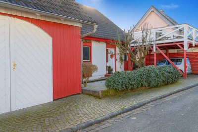 Freistehendes Einfamilienhaus mit Einliegerwohnung und großem Garten in ruhiger Lage von Omersbach!