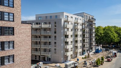 Elbbrücken-Erstbezug! Sonnige 2-Zimmer + Süd-West Balkon + moderne EBK + Loft-Bad